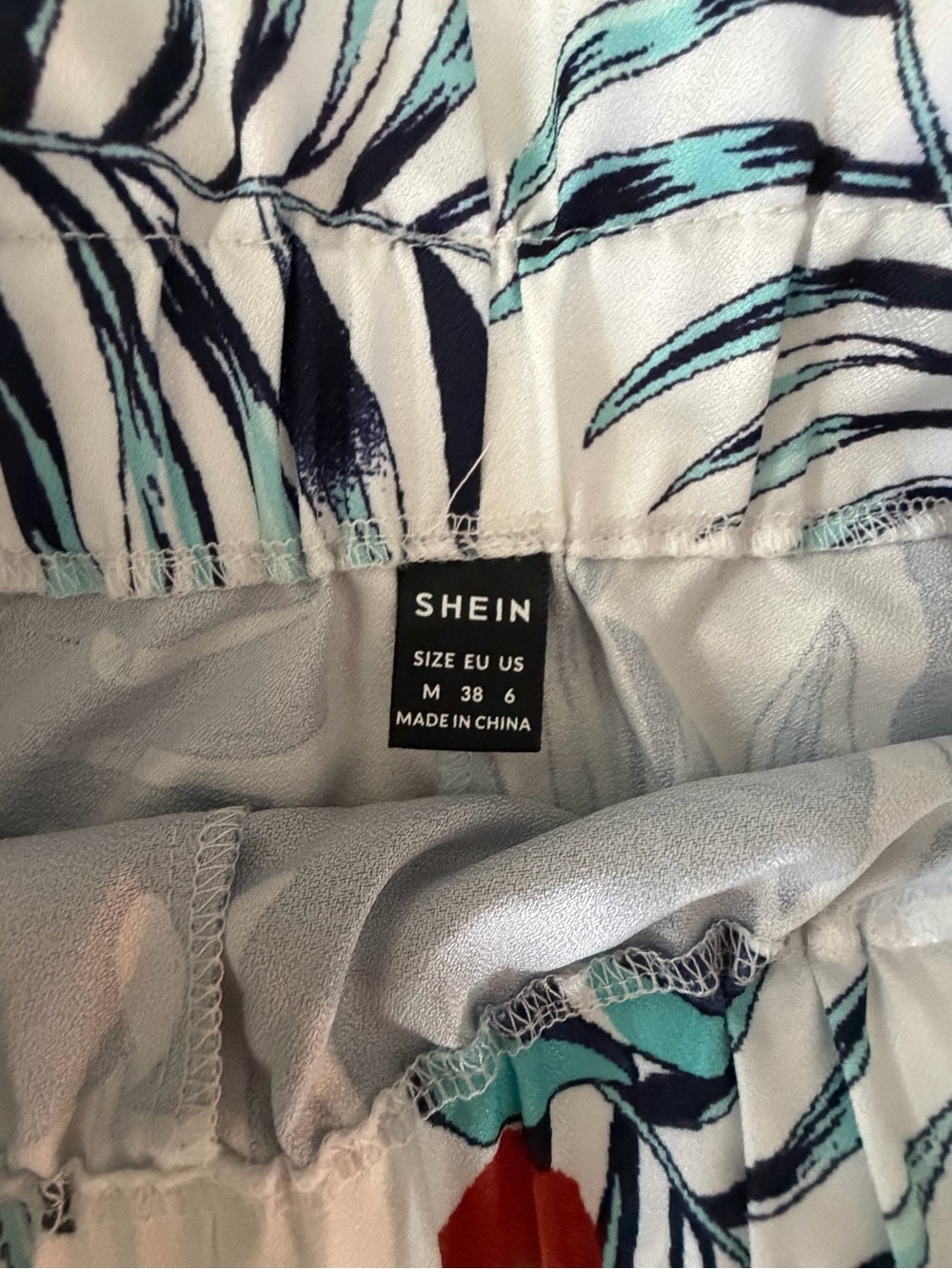 SHEIN White High-Waist Tropical Leaf Print Shorts with Navy & Teal Accents - Picture 3 of 3